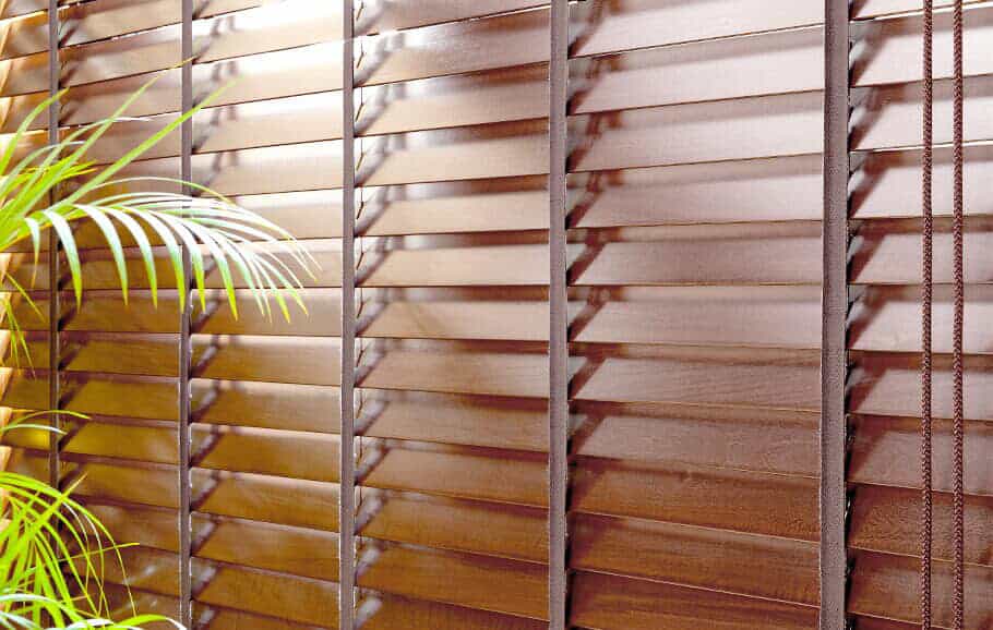 Custom wood blinds installed on large windows